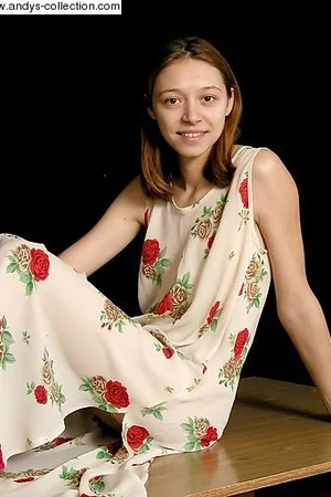 Girl in Floral Dress Lifts Skirt — photo 2