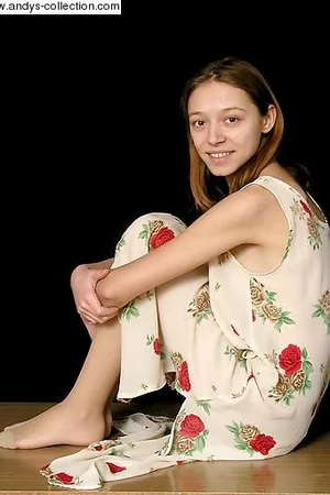 Girl in Floral Dress Lifts Skirt — photo 4