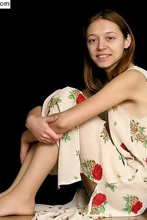 Girl in Floral Dress Lifts Skirt — photo 5