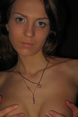 Modest Brunette Reveals Her Tits — photo 1