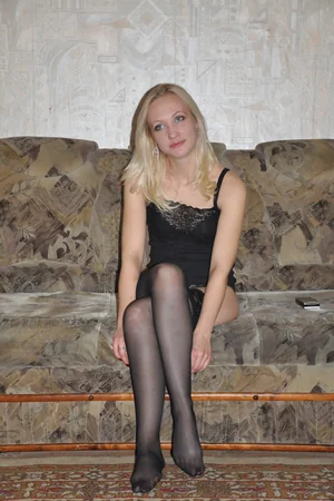 Blonde in Stockings Flashes Small Tits and Slender Figure for Camera — photo 4
