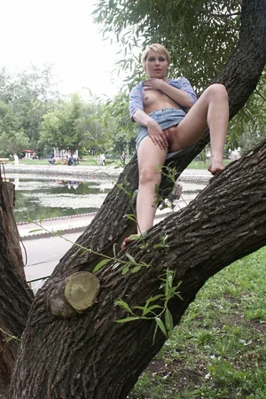 Russian Blonde Lifts Skirt in Yard, Shows Pussy — photo 3