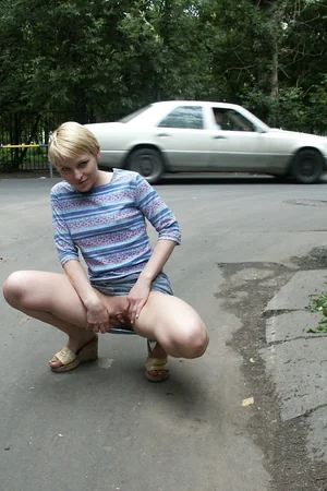 Russian Blonde Lifts Skirt in Yard, Shows Pussy — photo 8