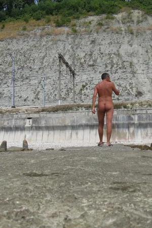 Nudist Couple Flashes Hard Dick and Saggy Tits on Beach — photo 14