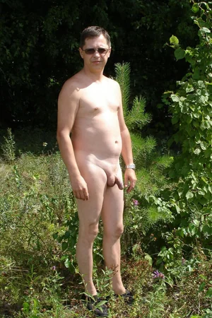 Nudist Couple Flashes Hard Dick and Saggy Tits on Beach — photo 17