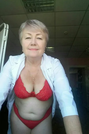 Russian Granny Flashes Shaved Pussy — photo 2