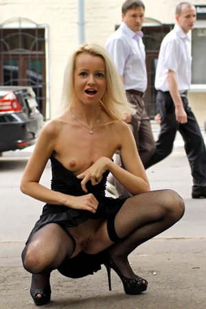 Skinny Blonde Flashes Pussy Outdoors — photo 11