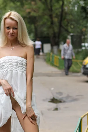 Skinny Blonde Flashes Pussy Outdoors — photo 13