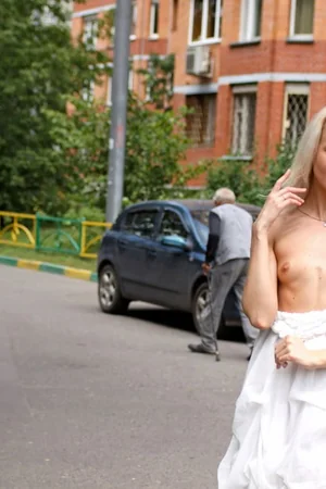 Skinny Blonde Flashes Pussy Outdoors — photo 18