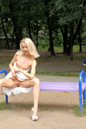 Skinny Blonde Flashes Pussy Outdoors — photo 25