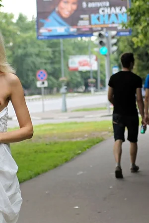 Skinny Blonde Flashes Pussy Outdoors — photo 3